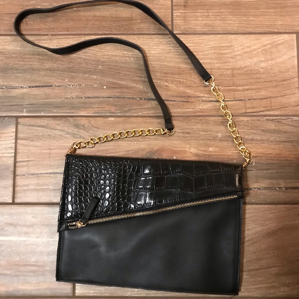 Chic black purse with gold accents